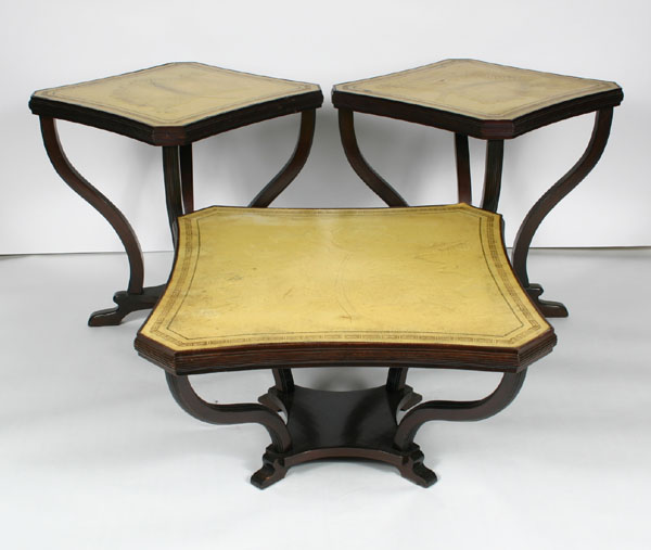 Three mahogany tables; each has