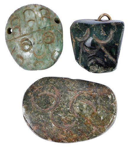 THREE MESOAMERICAN CARVED JADE MASK