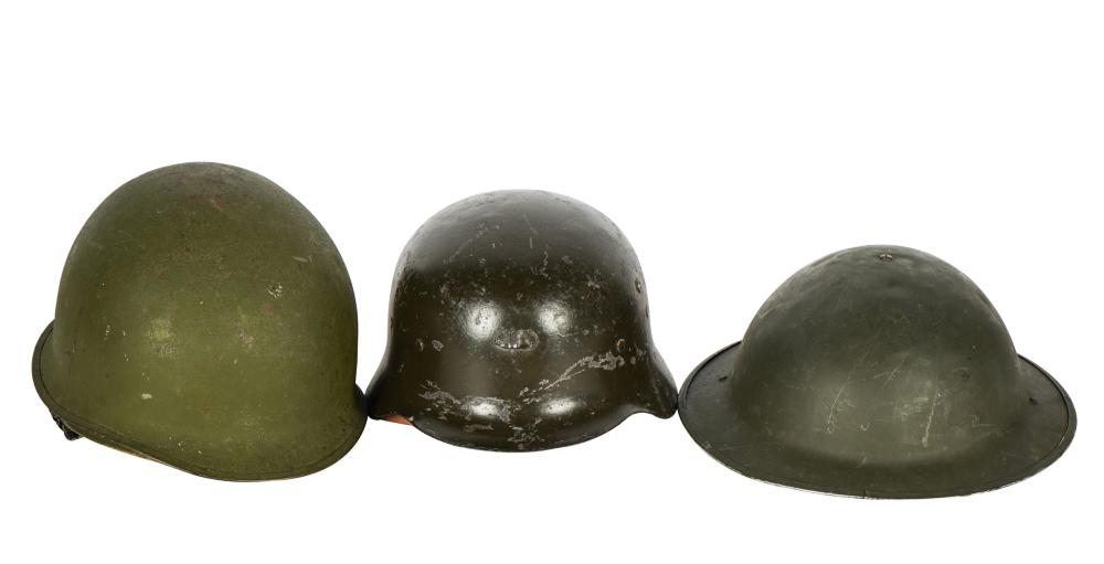 THREE MILITARY HELMETSpainted metal