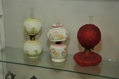 THREE MINIATURE LAMPS. A red