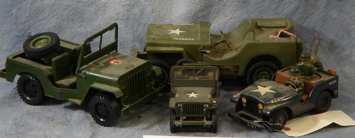 Three model Army Jeeps, along