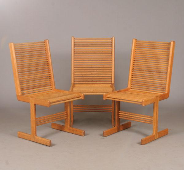 Three Modern design spindle chairs;
