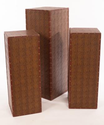 Three modern plinths in faux