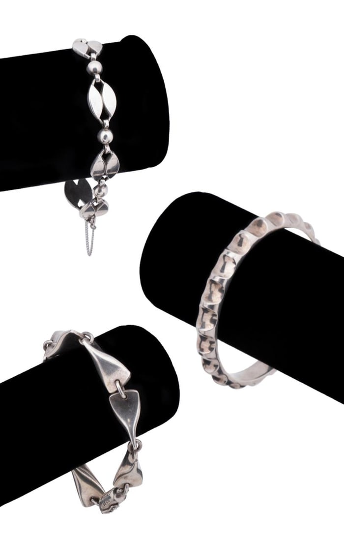 THREE MODERN STERLING BRACELETS,