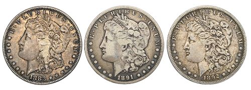 THREE MORGAN SILVER DOLLARSThree