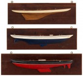 THREE MOUNTED HALF HULL MODELS