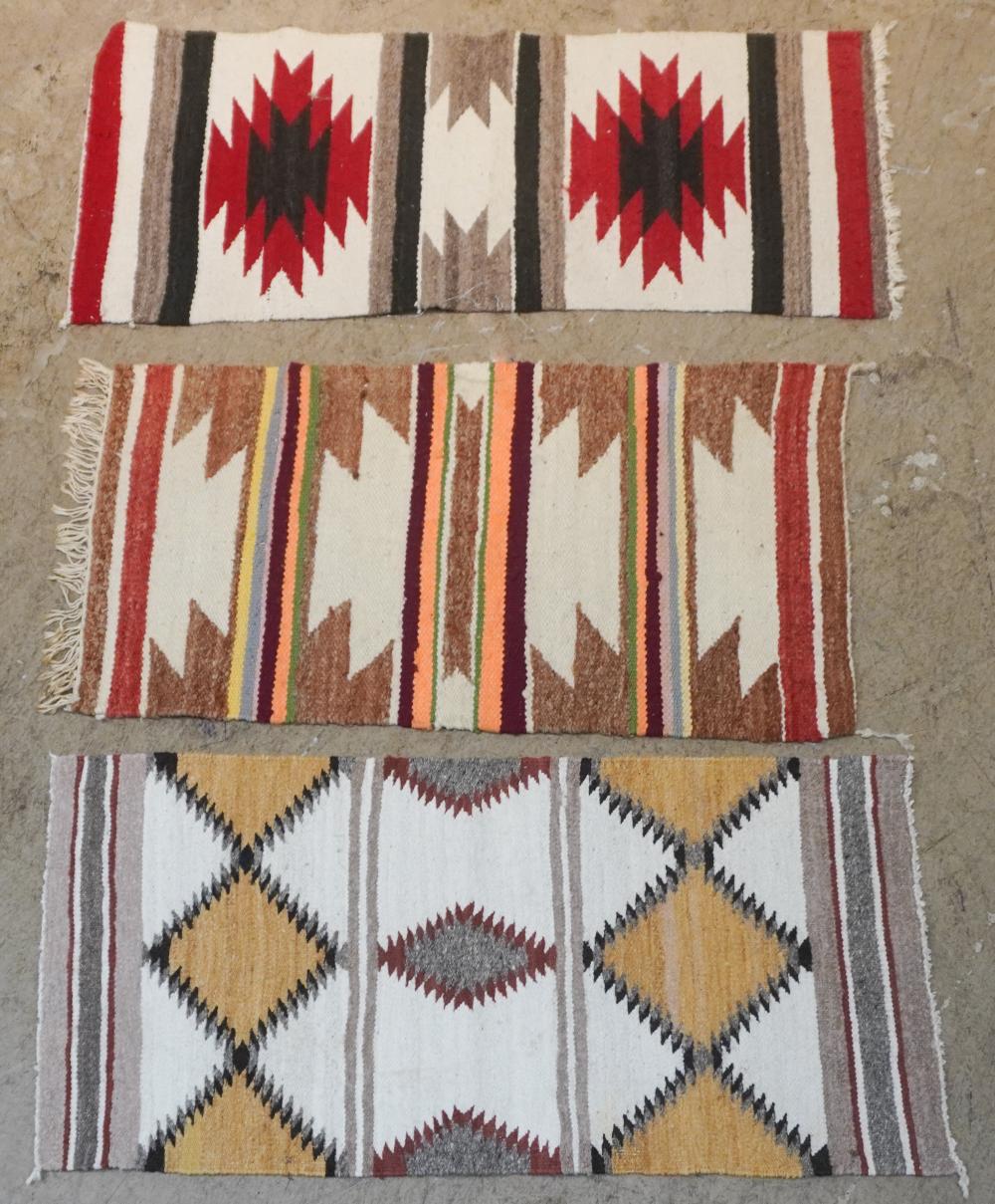 THREE NATIVE BLANKETS/FLOOR