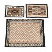 THREE NAVAJO AREA RUGS First w