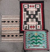 THREE NAVAJO REGIONAL WEAVINGS