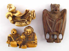 Three netsuke being a hardwood
