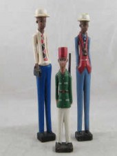 Three North African carved and