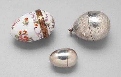 Three nutmeg graters, egg-shaped