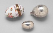Three nutmeg graters, egg-shap