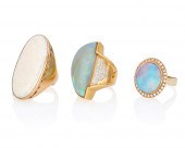 THREE OPAL RINGSThree opal rin