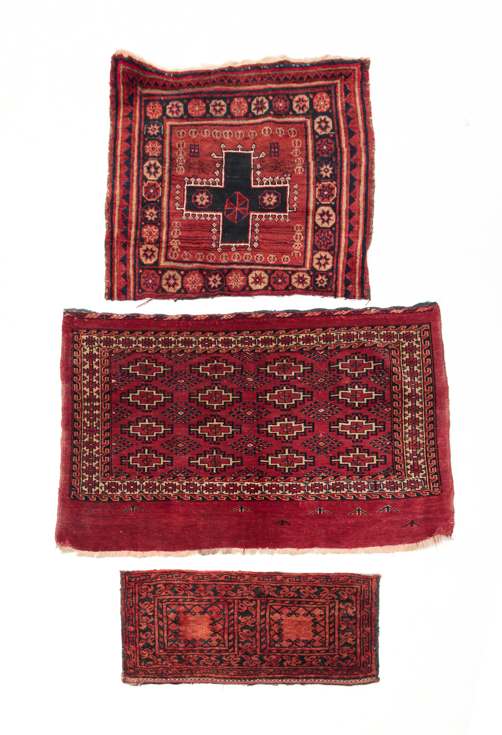 THREE ORIENTAL BAG FACES. First