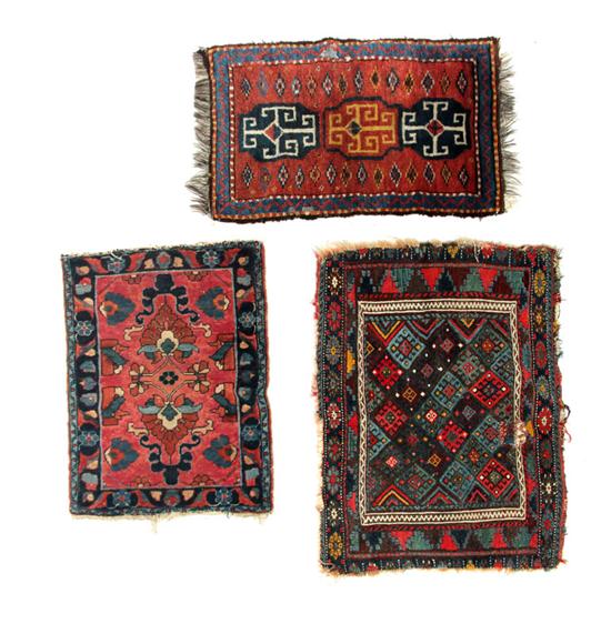 THREE ORIENTAL MATS.  Twentieth