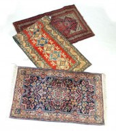 THREE ORIENTAL RUGS.  Persian