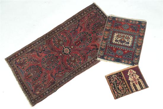 THREE ORIENTAL RUGS.  Twentieth
