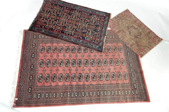 THREE ORIENTAL RUGS.  Twentieth