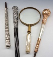 THREE ORNATE PARASOL HANDLES &