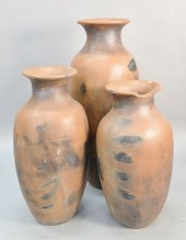 THREE OUTDOOR TERRACOTTA URNS,