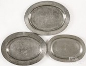 THREE OVAL PEWTER PLATTERS, 18