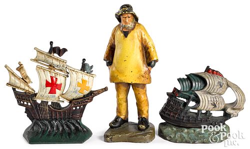 THREE PAINTED CAST IRON