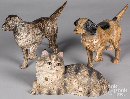 THREE PAINTED CAST IRON