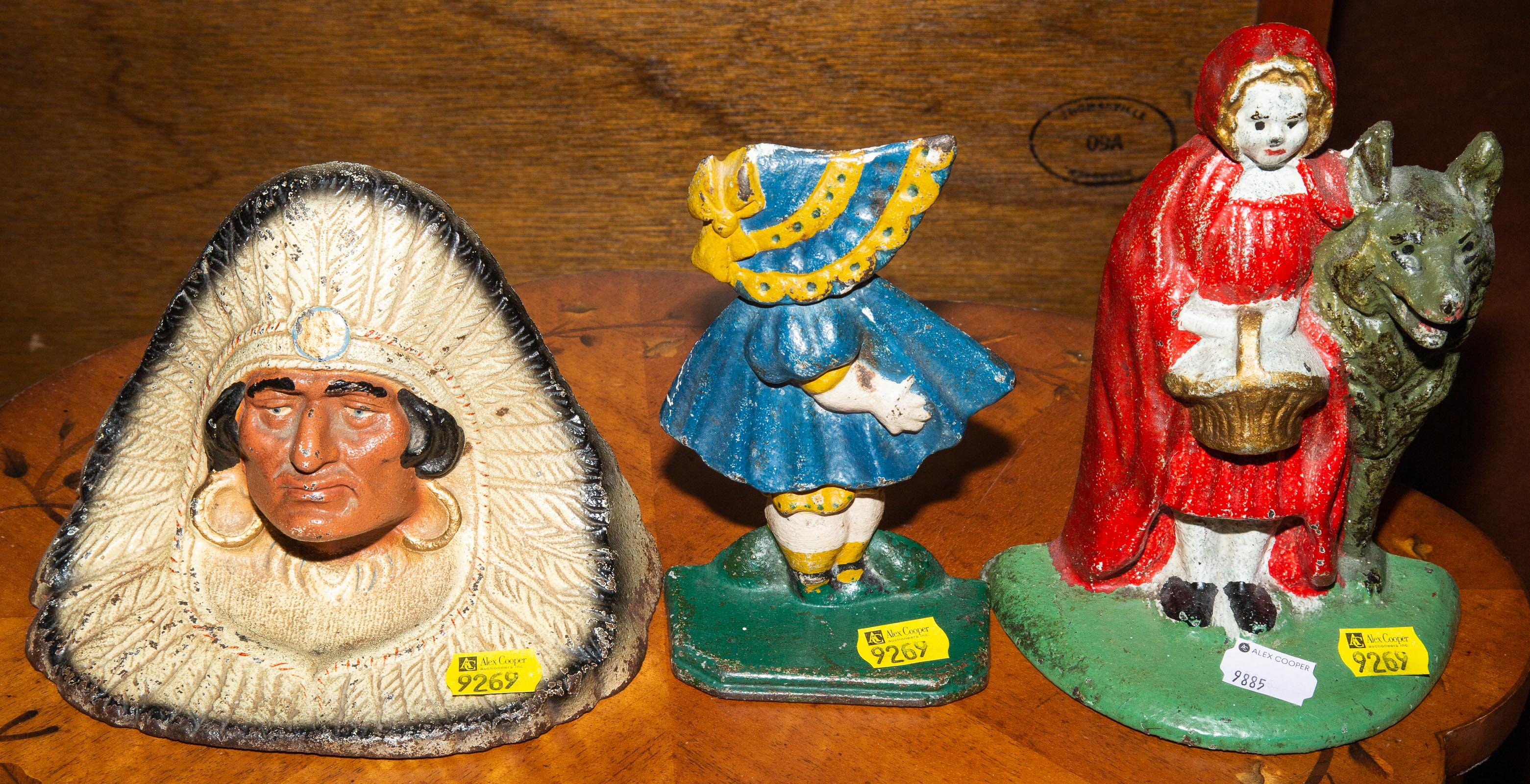THREE PAINTED CAST IRON FIGURAL