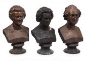 THREE PAINTED PLASTER BUSTS OF