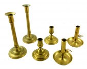 THREE PAIR OF BRASS CANDLESTIC