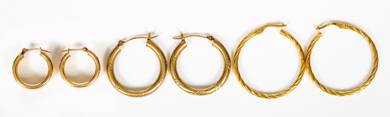 THREE PAIRS OF 14K YELLOW GOLD HOOP