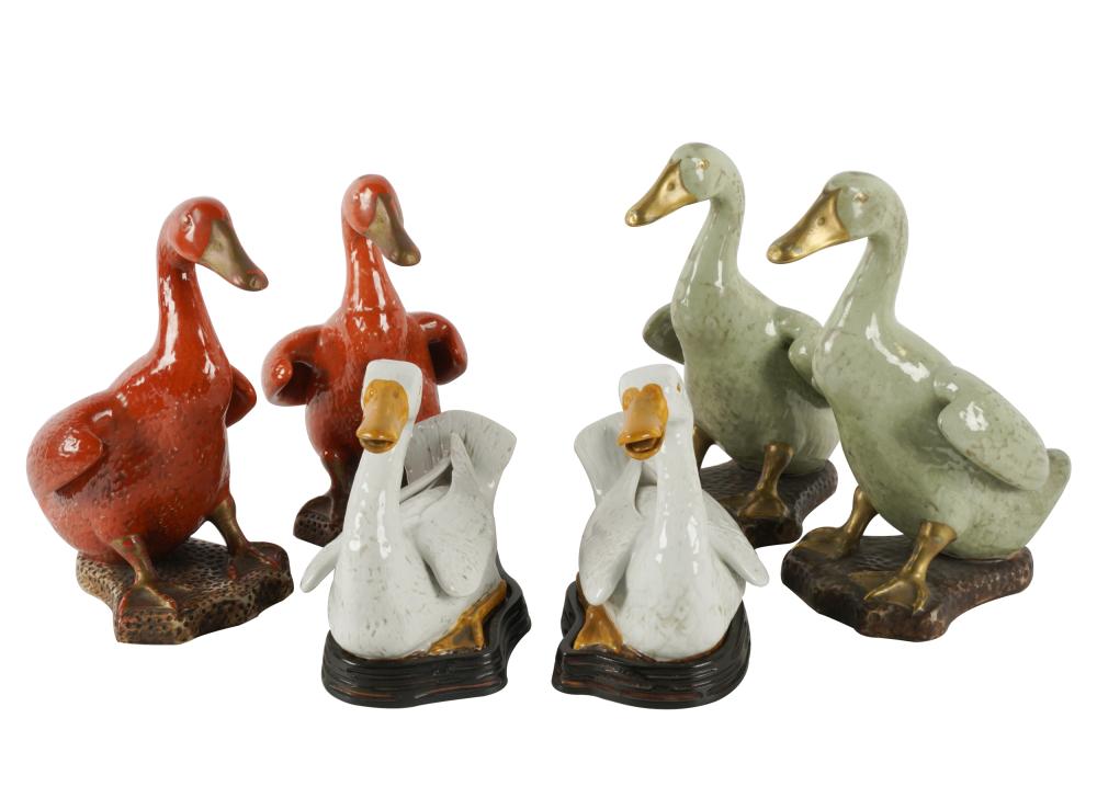 THREE PAIRS OF GLAZED CERAMIC