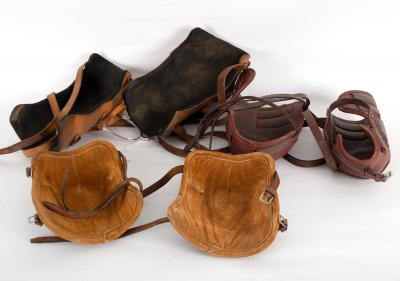 Three pairs of leather knee