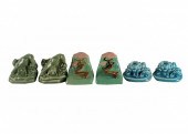 THREE PAIRS OF POTTERY BOOKEND