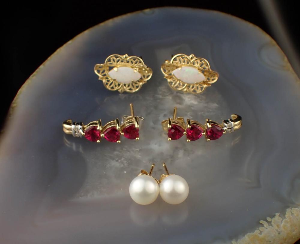 THREE PAIRS OF YELLOW GOLD