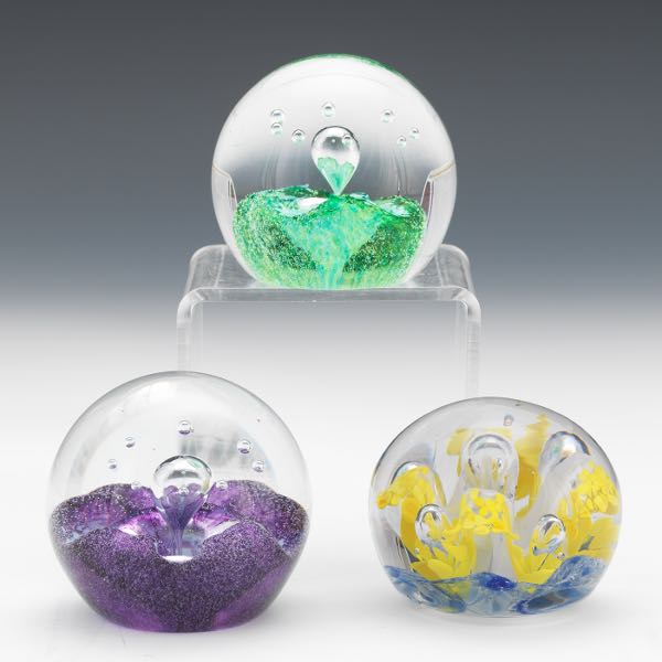 THREE PAPERWEIGHTS  Two CUG