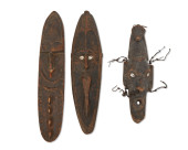 THREE PAPUAN CARVED WOOD MASKS