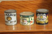 THREE PEANUT BUTTER TINS. All