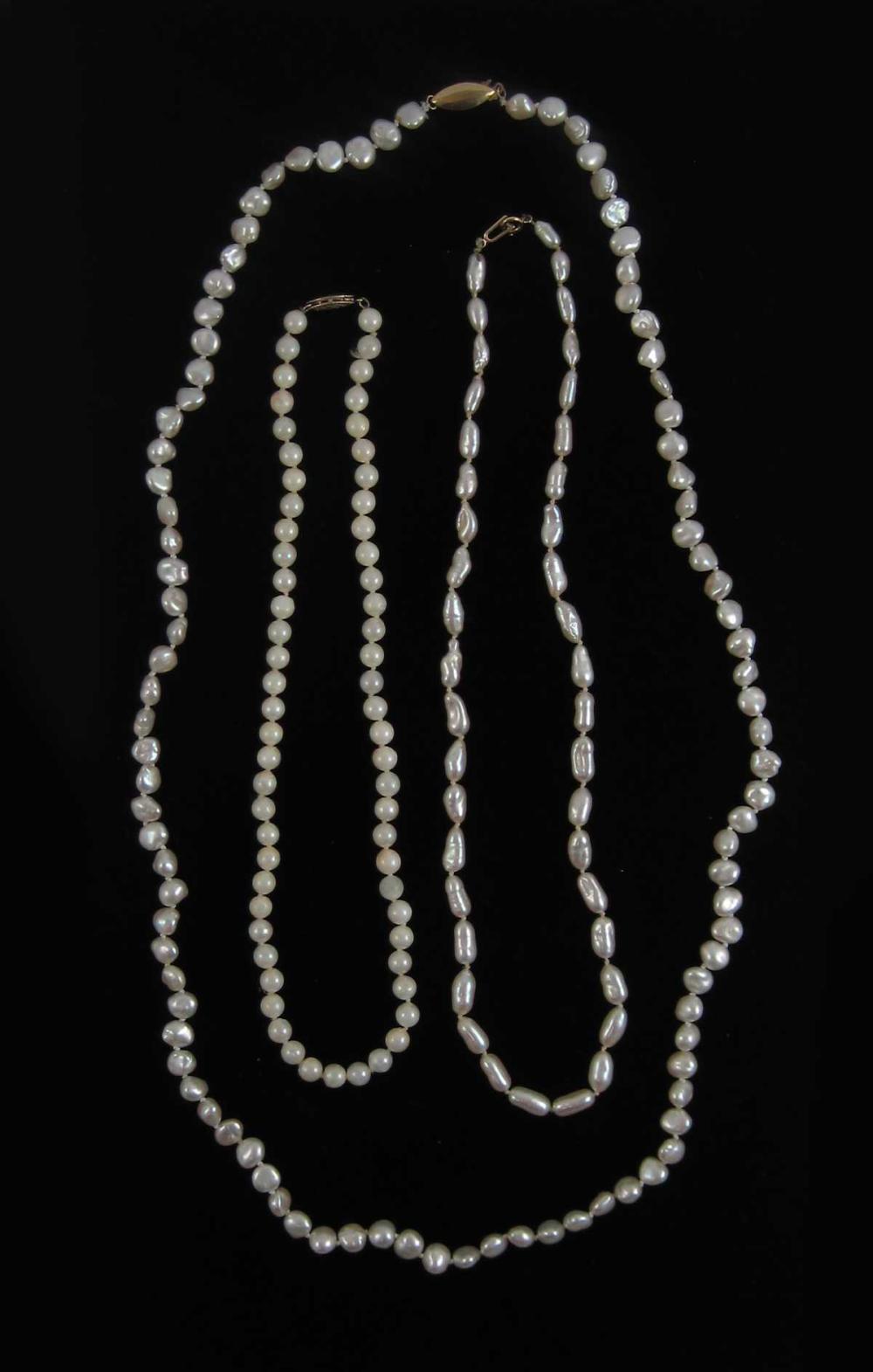 THREE PEARL AND FOURTEEN KARAT GOLD