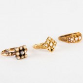 THREE PEARL AND GOLD RINGSOne
