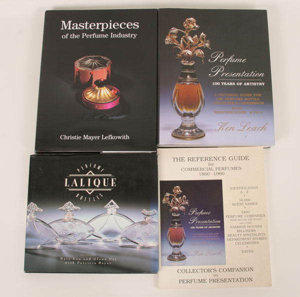 Three perfume bottle hardback