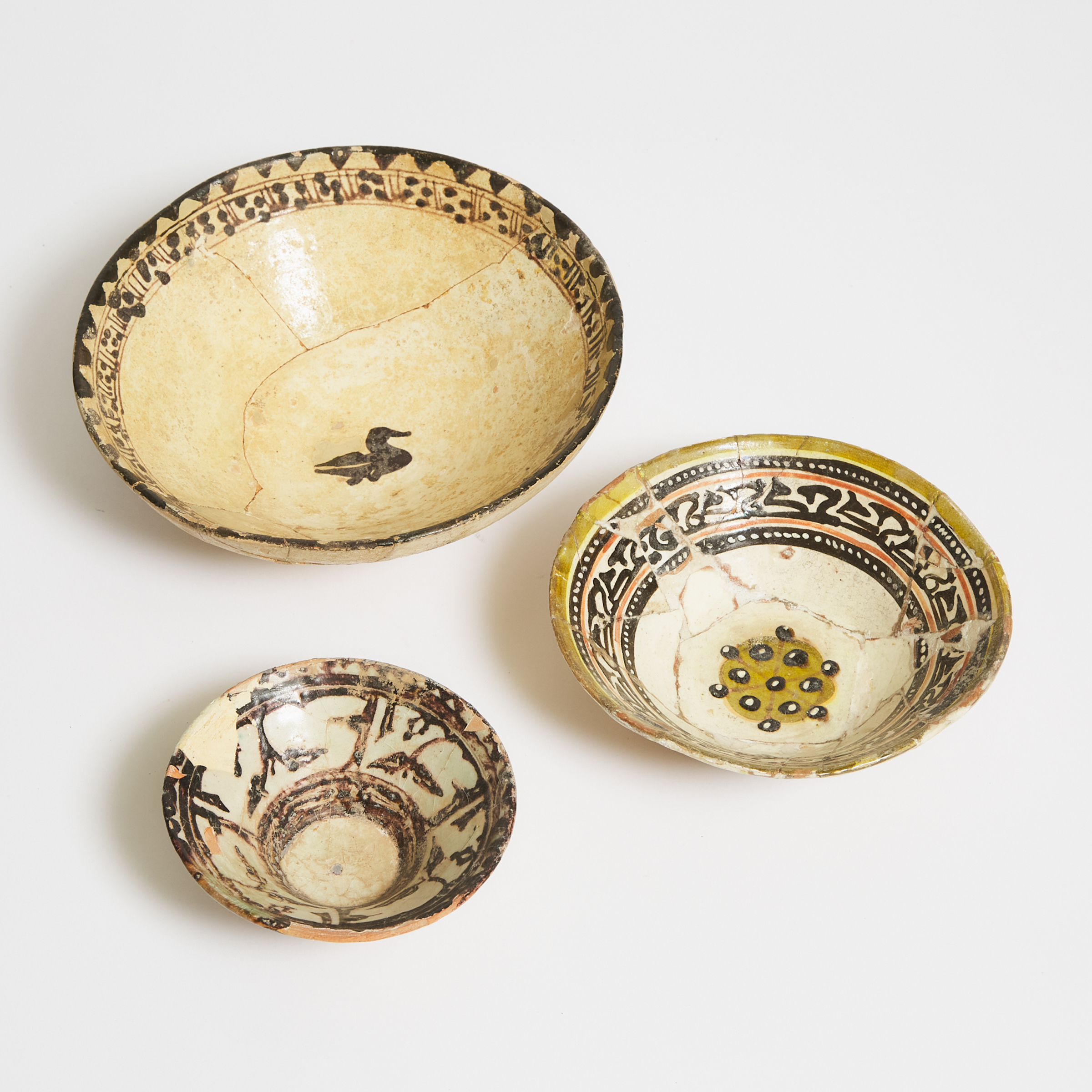 Three Persian Pottery Bowls,
