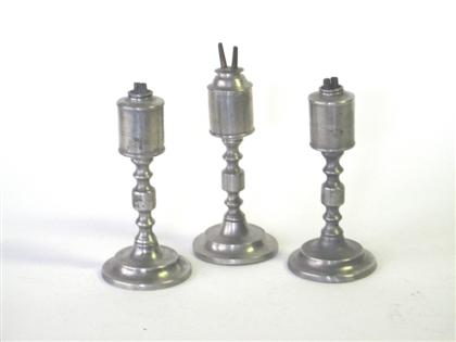 Three pewter cylinder-form font