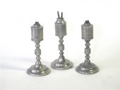 Three pewter cylinder-form fon