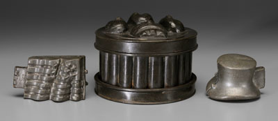 Three pewter molds: American