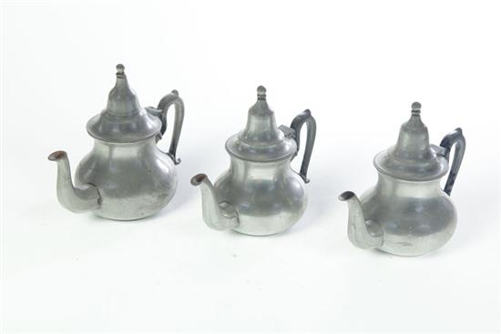 THREE PEWTER TEAPOTS.  European 