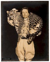 THREE PHOTOGRAPHS OF ANIMAL TR