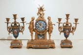 THREE-PIECE PORCELAIN AND GILT