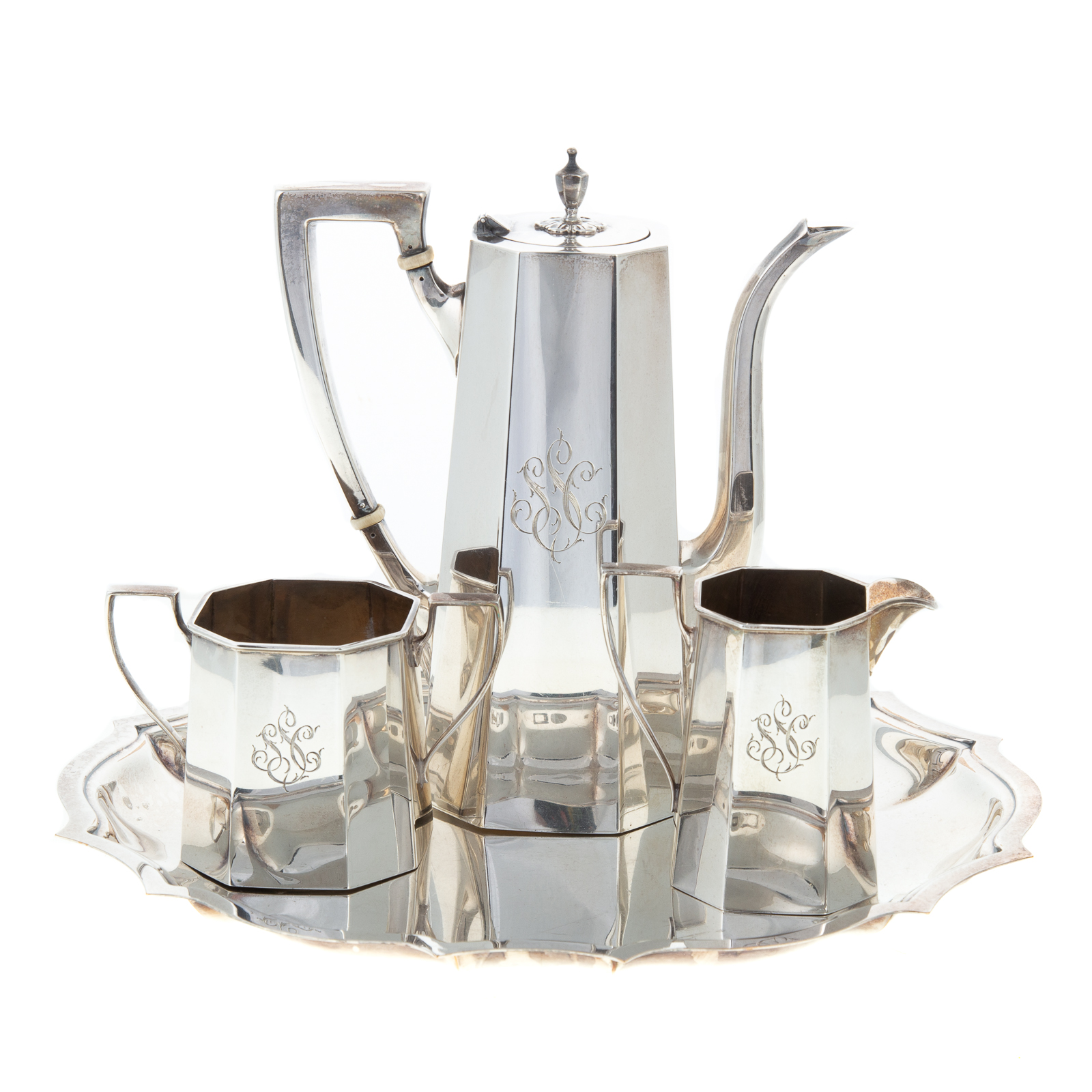 THREE-PIECE REDLICH & CO.